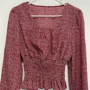 A floral square open neck long sleeve top